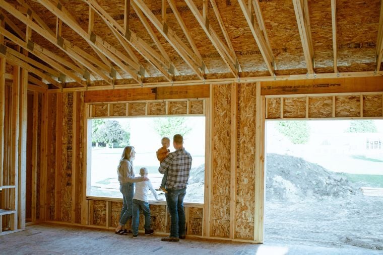 Iowa couple building a custom home in rural Iowa, considering a construction-to-permanent loan.